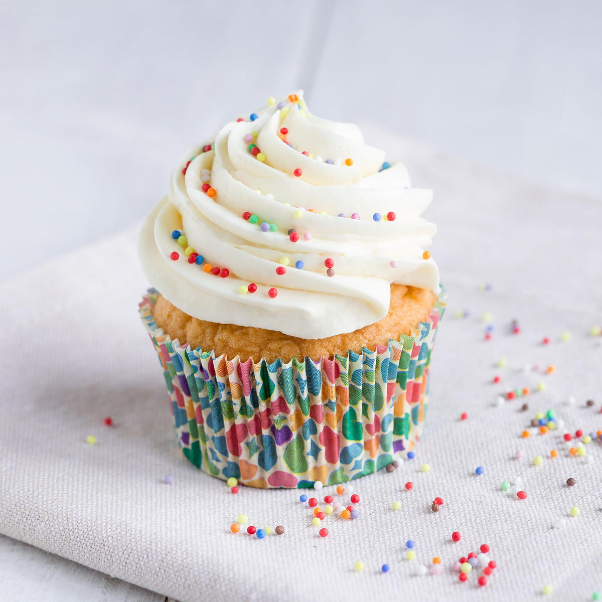 Yupik sprinkles on ice cream create playful color swirls.