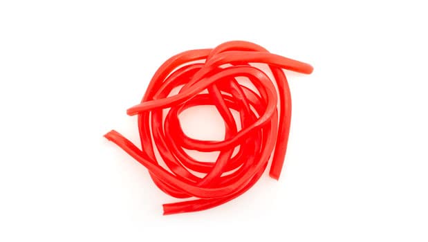 Yupik Strawberry Licorice Laces highlight chewy texture, great for desserts and gifting.