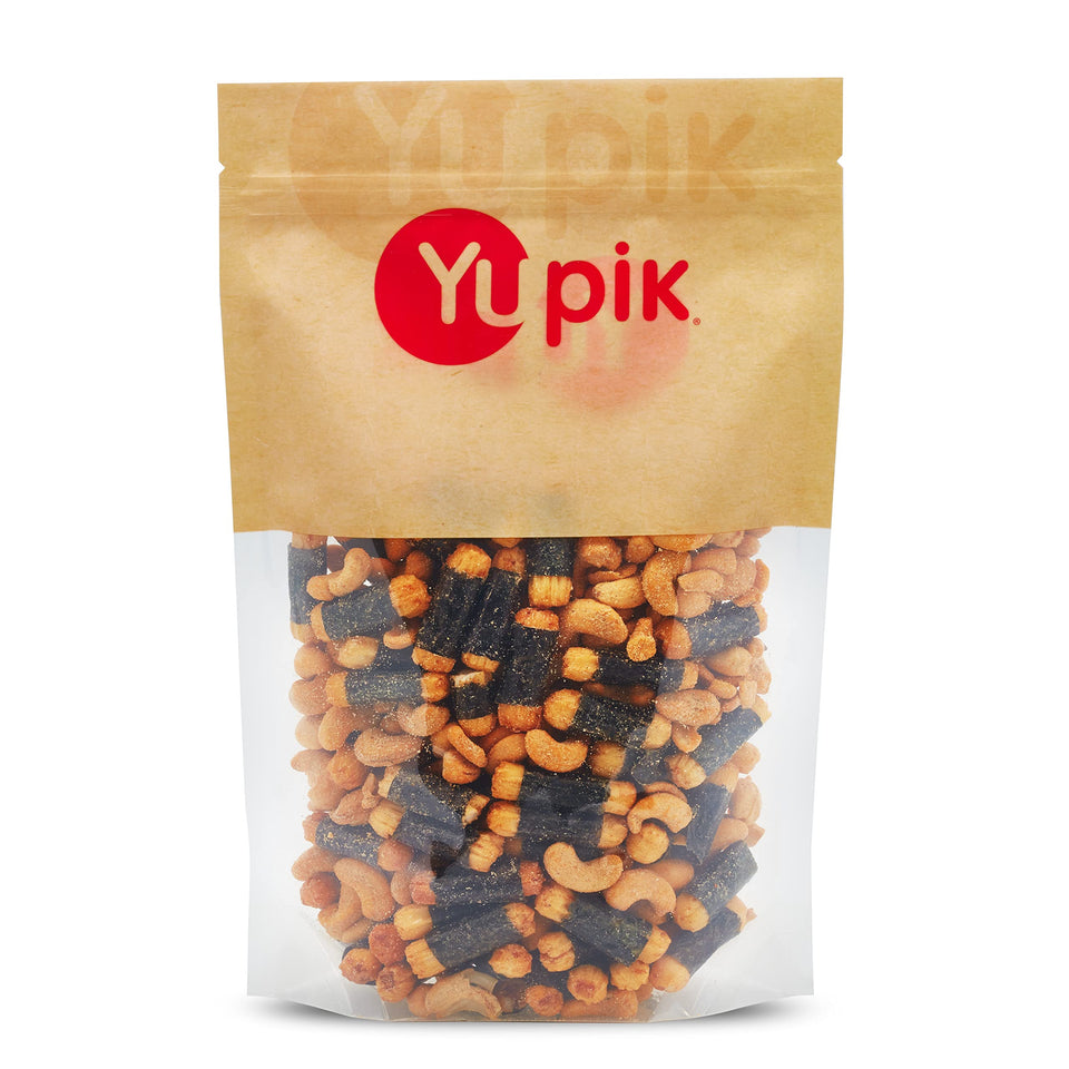 Yupik Sushi Cashew Mix crackers on plate, savory sushi-inspired snack for gatherings.