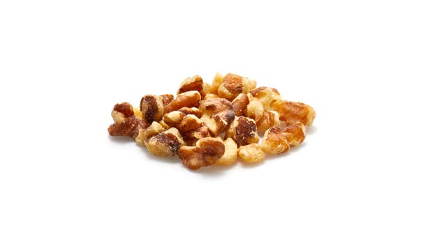 Yupik walnuts in a bowl showing crunchy, oil-free texture