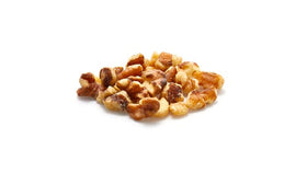 Yupik walnuts in a bowl showing crunchy, oil-free texture