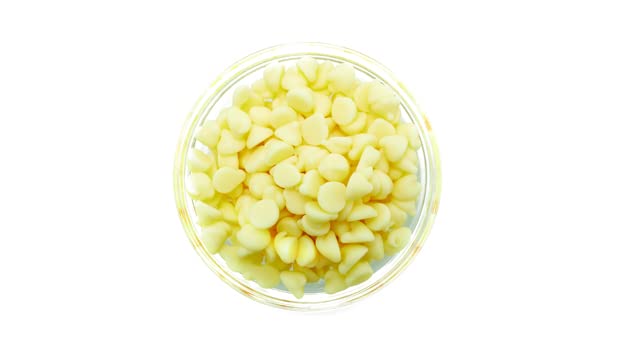 Yupik White Chocolate Chips closeup texture showing creamy cocoa butter melt