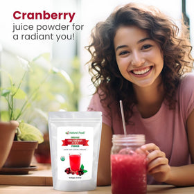 Z Natural Foods Cranberry Powder stirred into a blueberry smoothie for daily wellness
