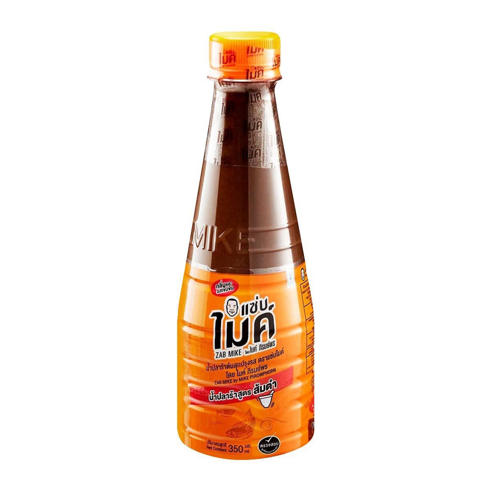 ZAB MIKE pasteurized Thai fish sauce bottle pouring for authentic Som Tum flavor.