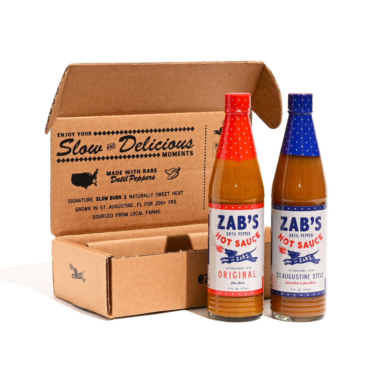 Zab's Original hot sauce bottle pour highlighting sweet heat from Datil peppers for versatile meals