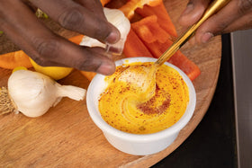 Zaffrus saffron powder jar with green cap for easy, measured seasoning.
