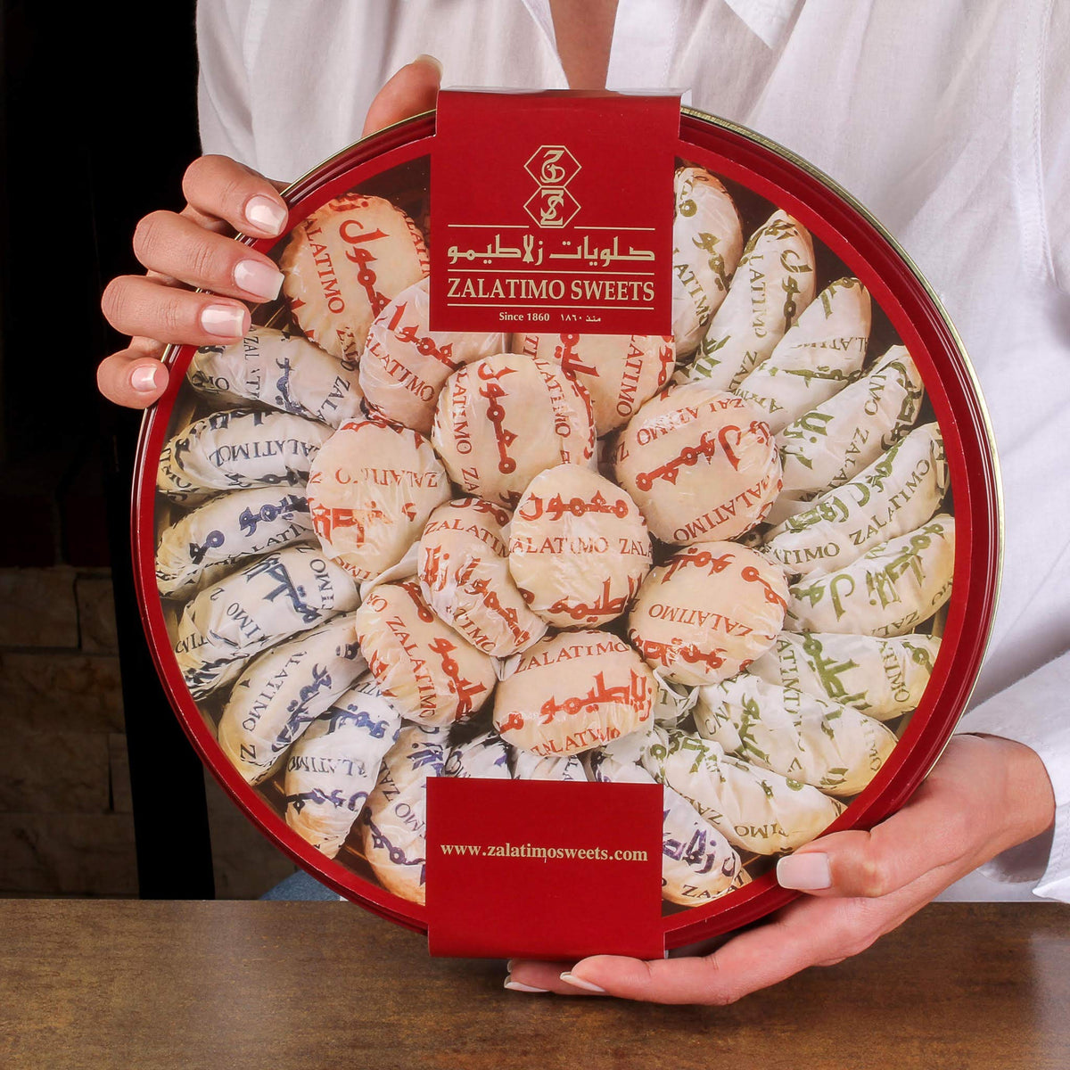 Zalatimo Gift Round Tin presents an elegant, ready-to-share treat.