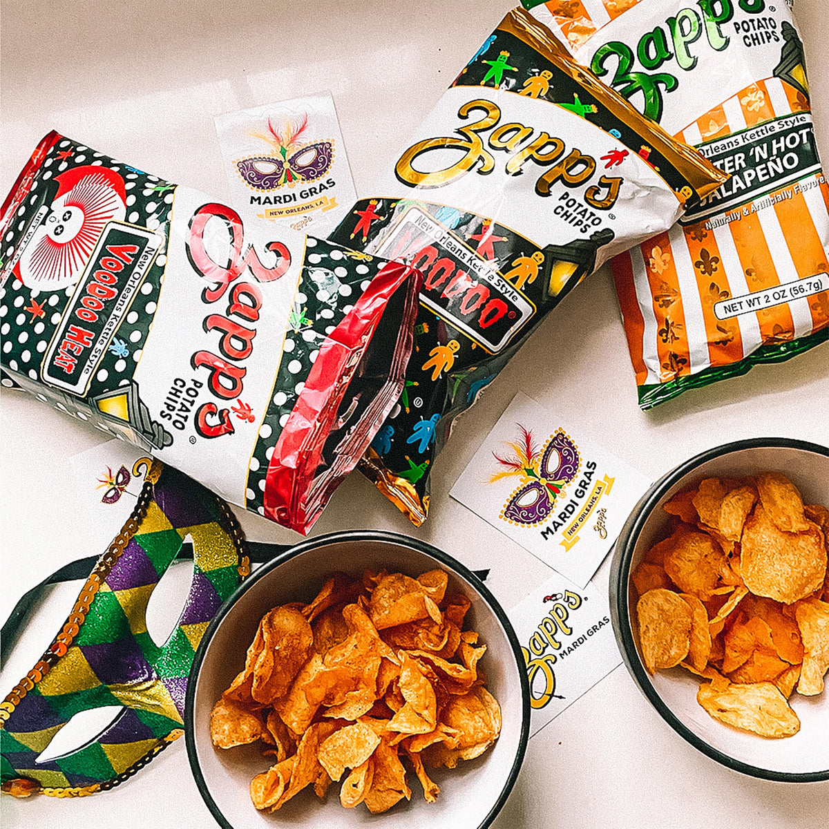 Zapp’s New Orleans Voodoo chips crunch close-up, bold kettle-style texture.