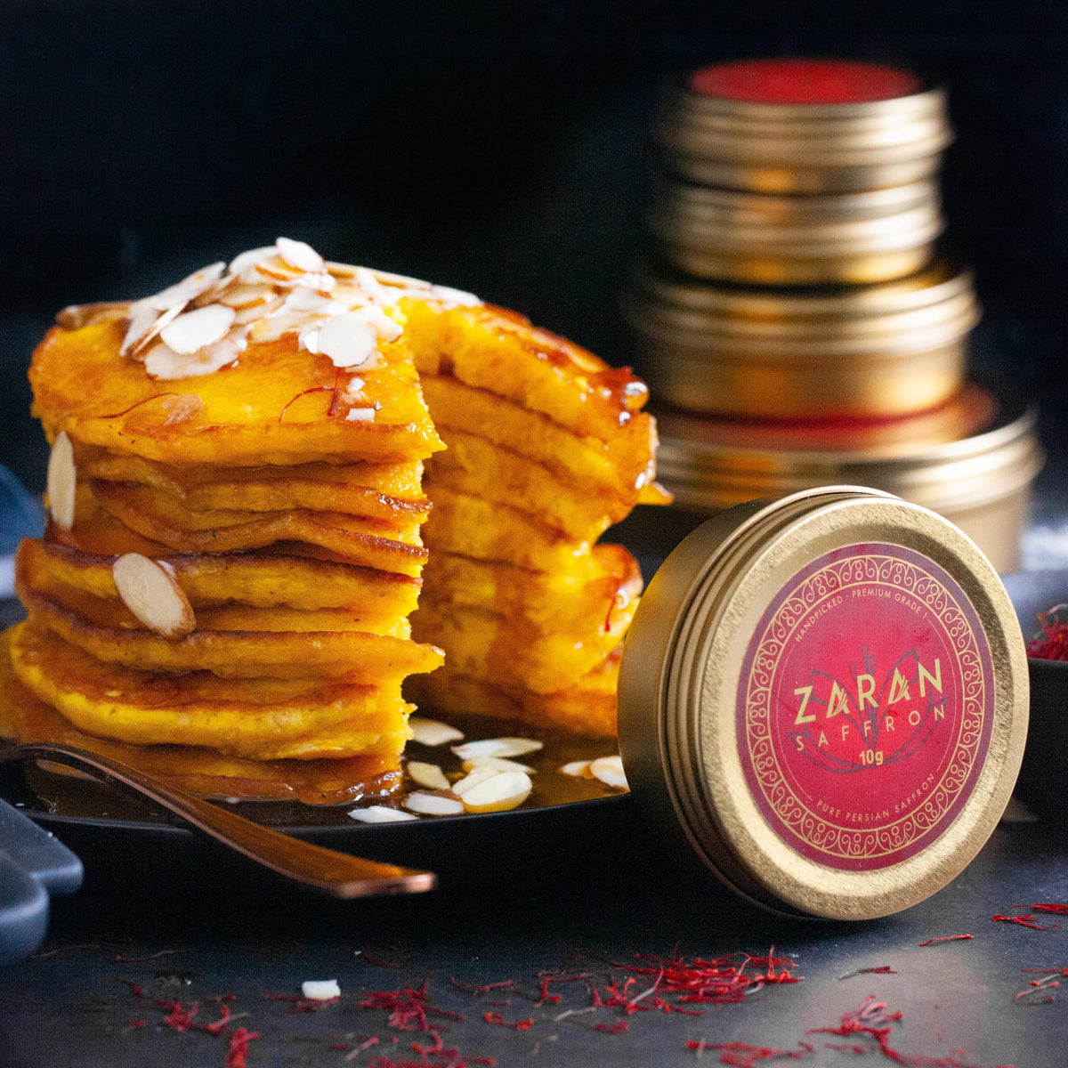 Zaran Saffron Paella dish showcases vibrant color and golden saffron threads.