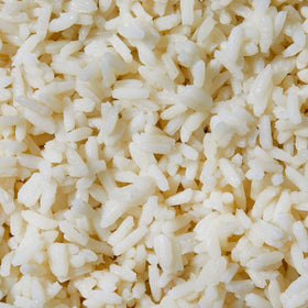 Zatarain's rice in a bowl with vegetables for a colorful meal.