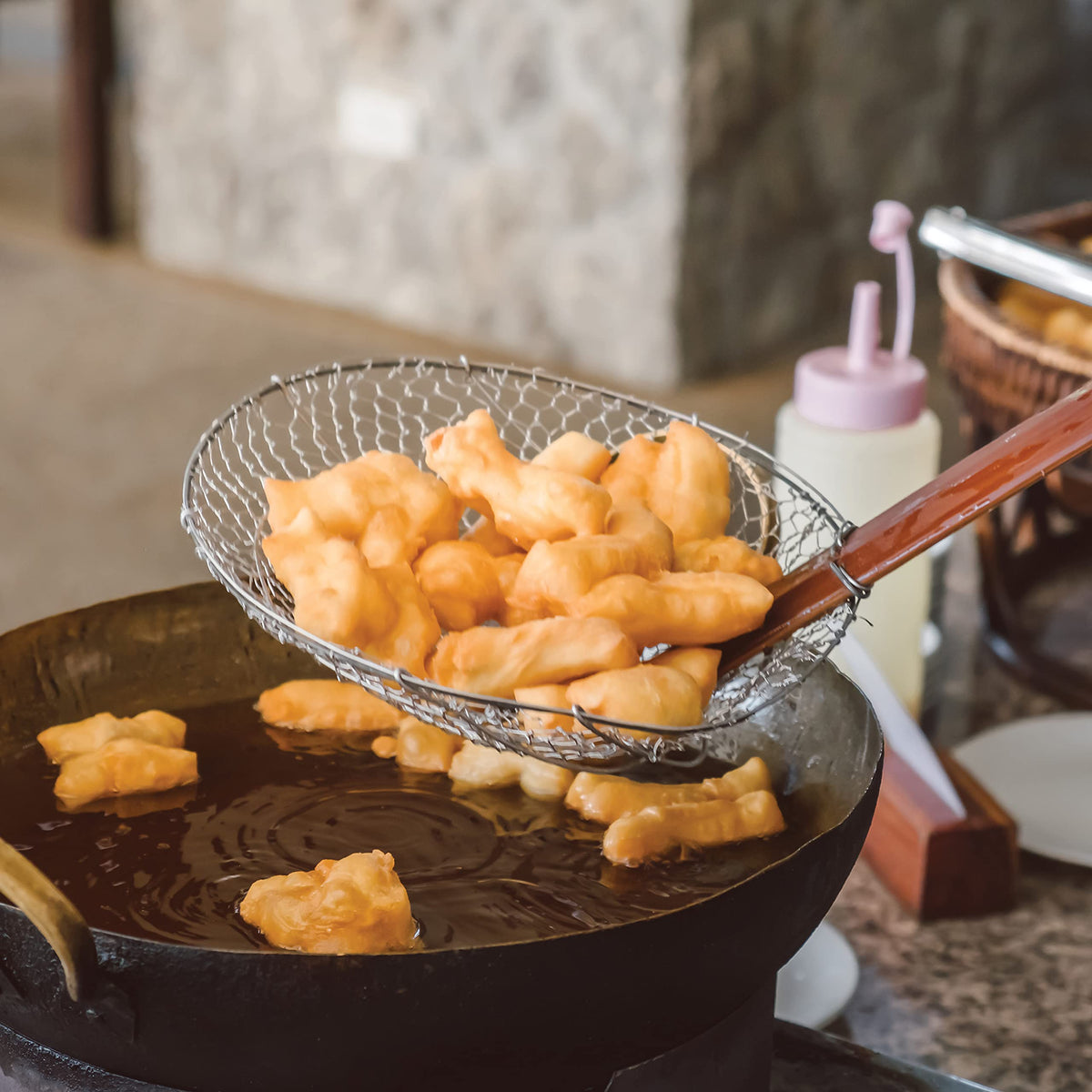 Zatarain's Fish Fri coating applied to shrimp for a crisp fry.