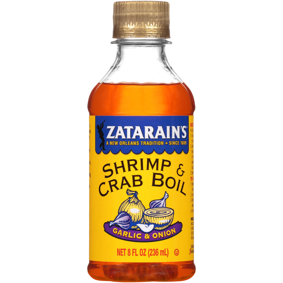 Zatarain's liquid shrimp boil bottle ready for seafood boils with bold garlic and onion flavor.