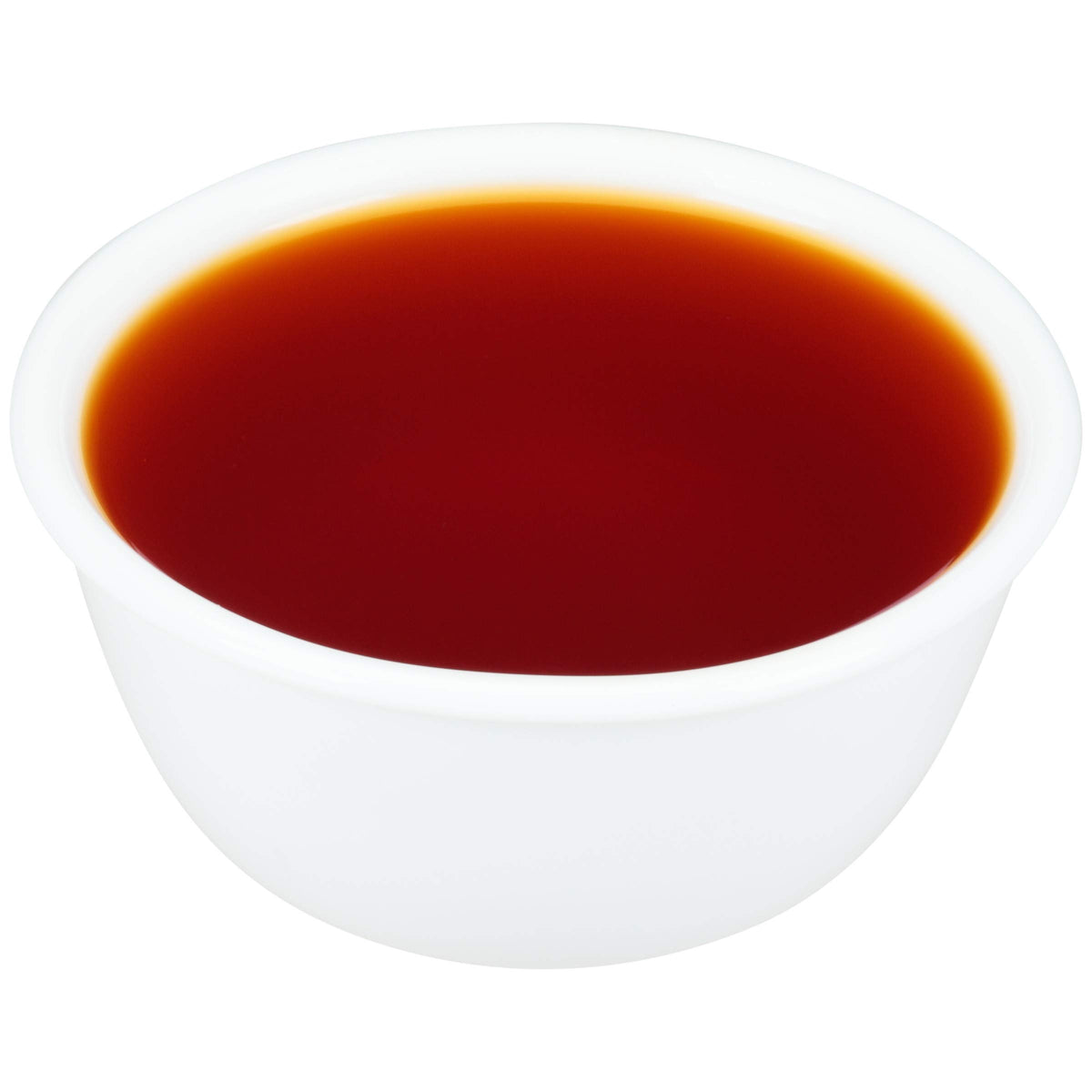 Zatarain's concentrated boil bottle with spoon demonstrates chef-friendly portioning