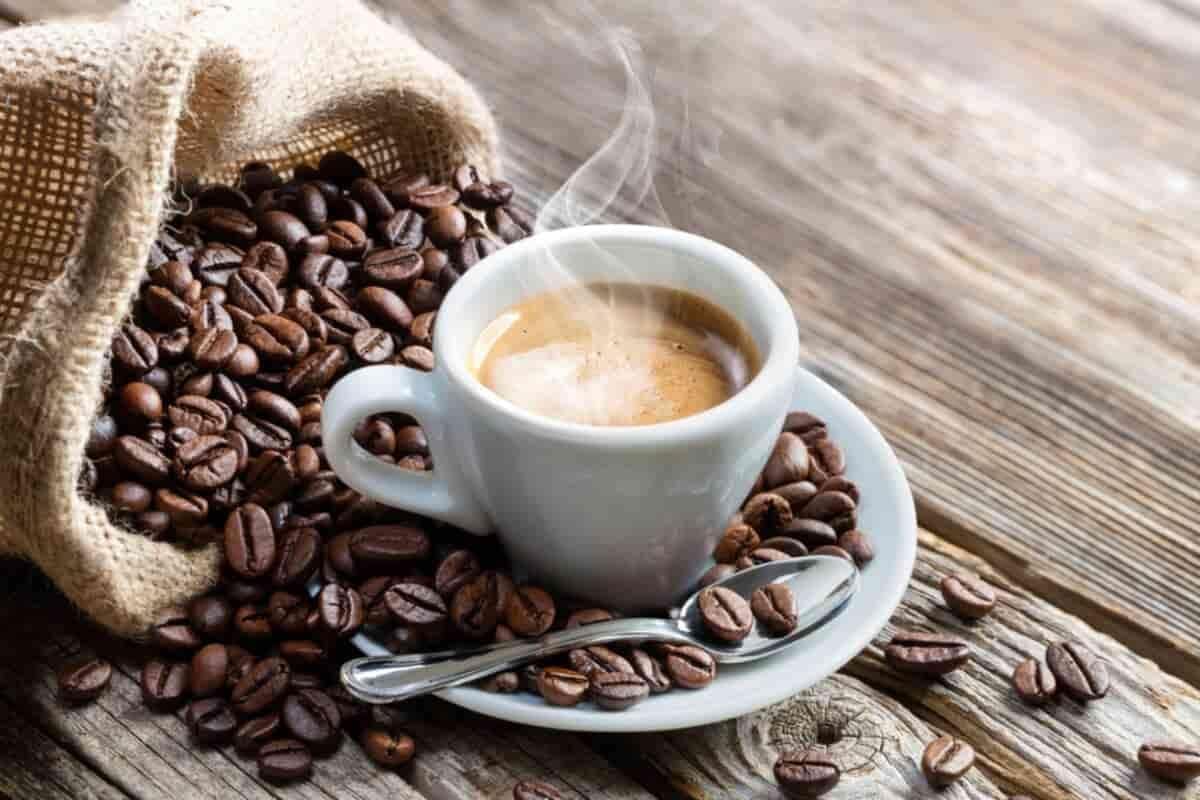 Steaming cup of Zavida hazelnut vanilla coffee showcasing rich aroma and balanced flavor.