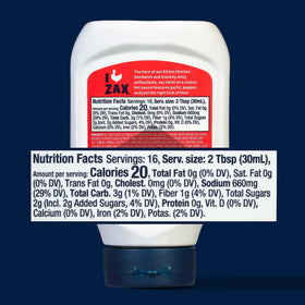Two-pack of Zaxby's Tongue Torch Sauce bottles on a kitchen counter.
