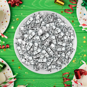 Zazers candy jar display ideas with silver-wrapped treats.