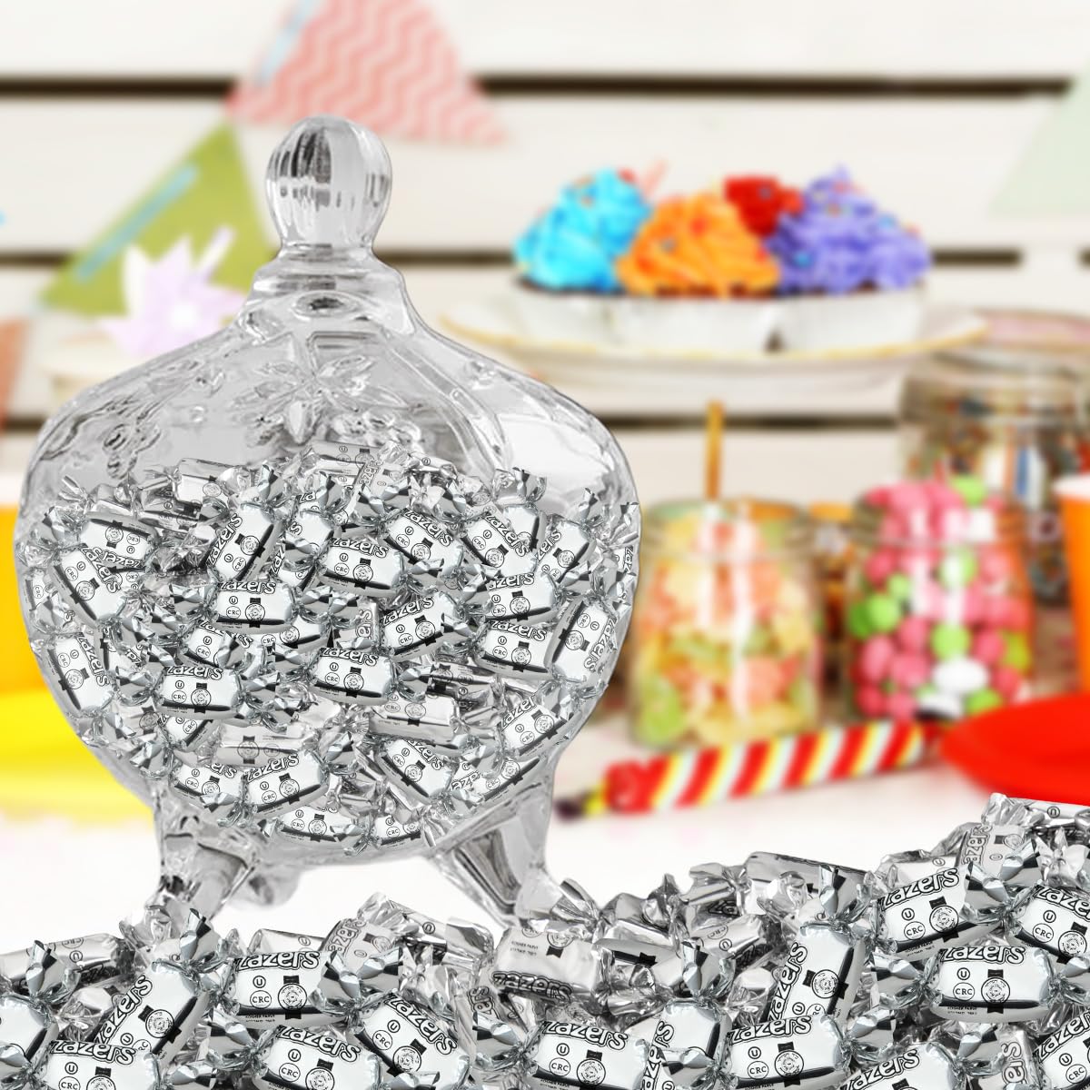 Zazers silver-wrap party candy adds sparkle to color-themed decor.
