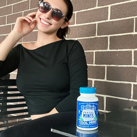 Zellie's mints on the go demonstrate easy, pocketable freshness for travel.