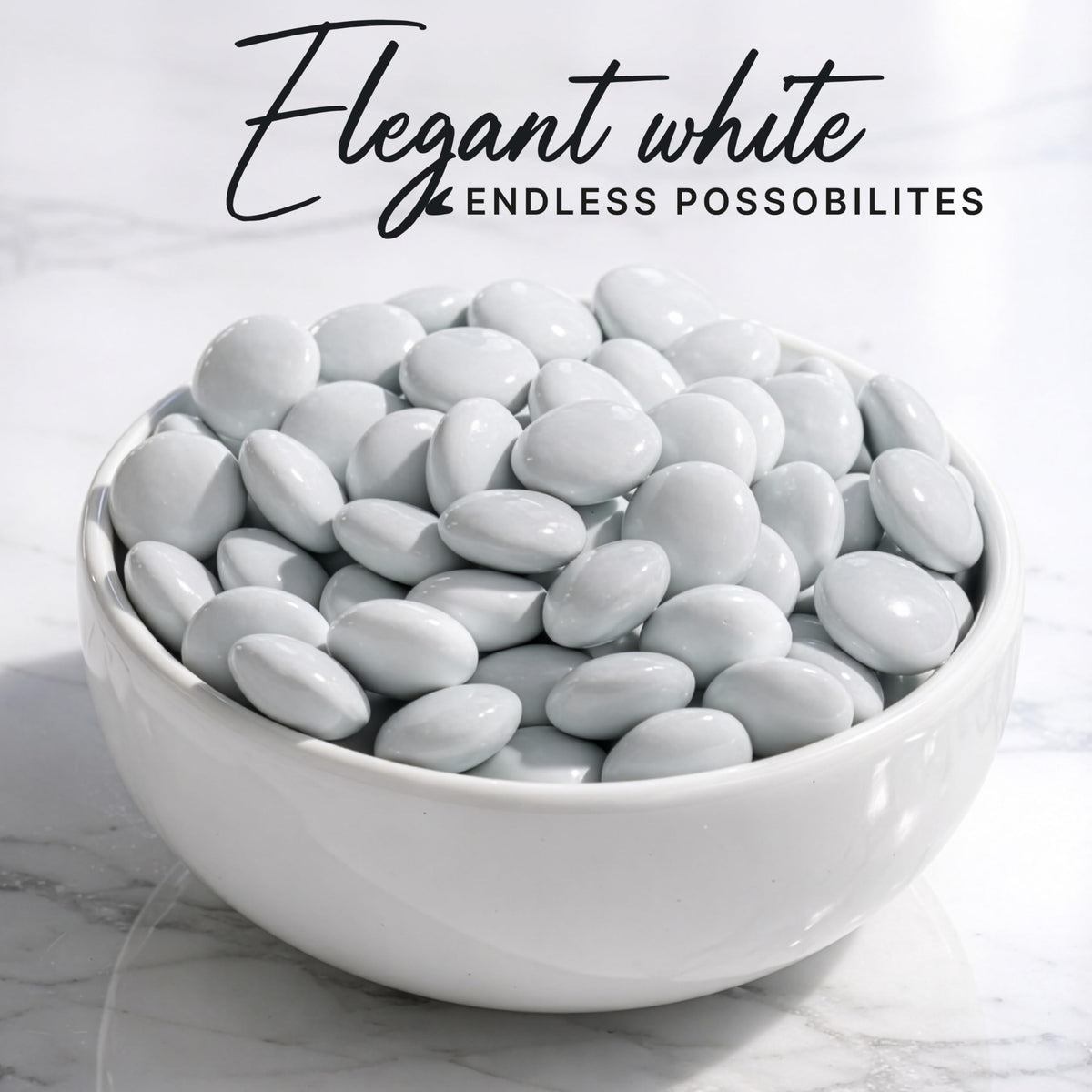 Zestix candy buffet display with white shells and uniform bites for weddings.