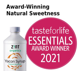 Pouring Zint Yacon Syrup into tea for a subtle, fiber-friendly flavor.