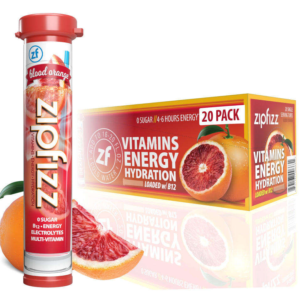 Zipfizz blood orange powder tube dissolving for sustained, sugar-free energy.
