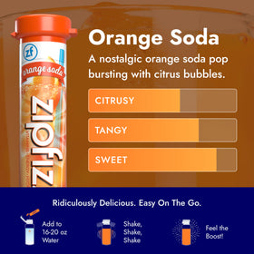 Zipfizz glass with a vibrant orange drink ready to sip