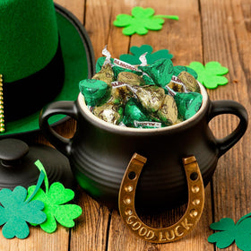 Zisbers green foil-wrapped chocolates add festive color to Saint Patrick's Day displays.