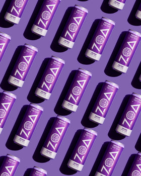 ZOA bottle with pouring can illustrate amino acids and steady lift.