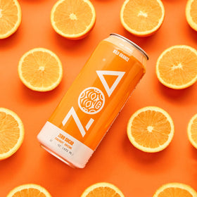 ZOA Wild Orange pours into a glass illustrating natural caffeine release